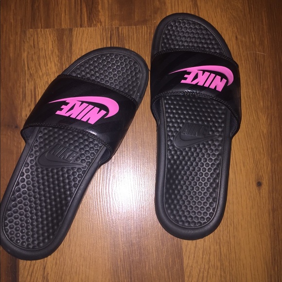 nike slides with pink logo